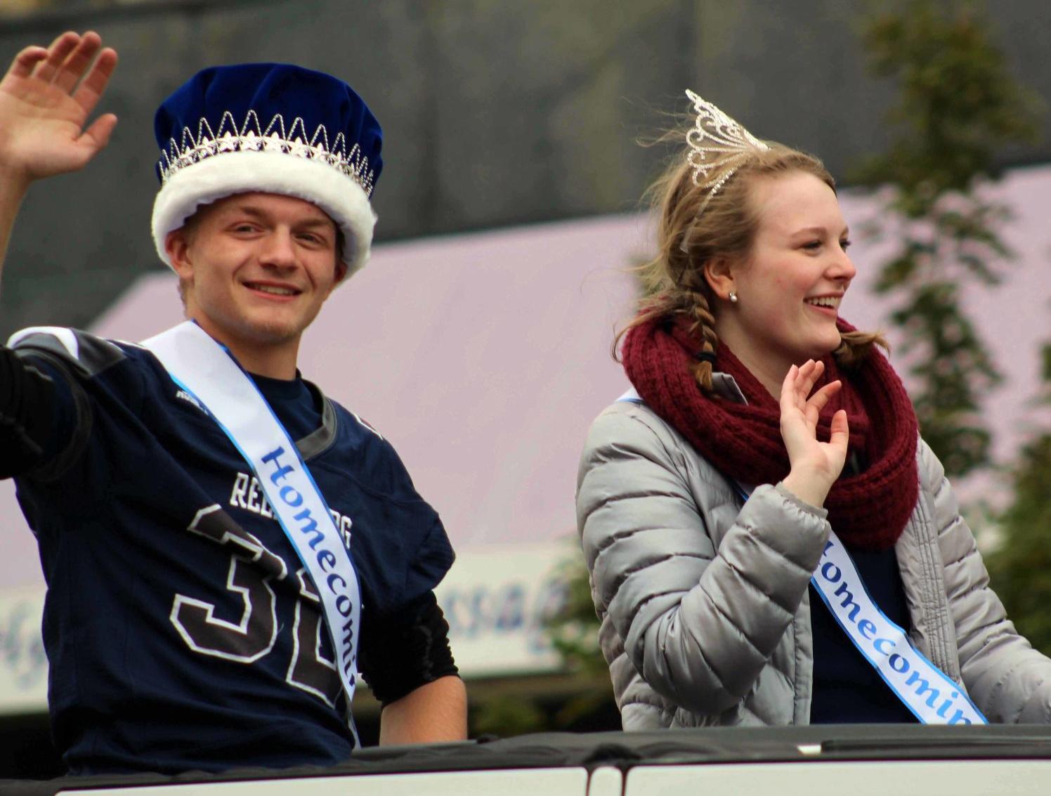 Larry and Alexis wave